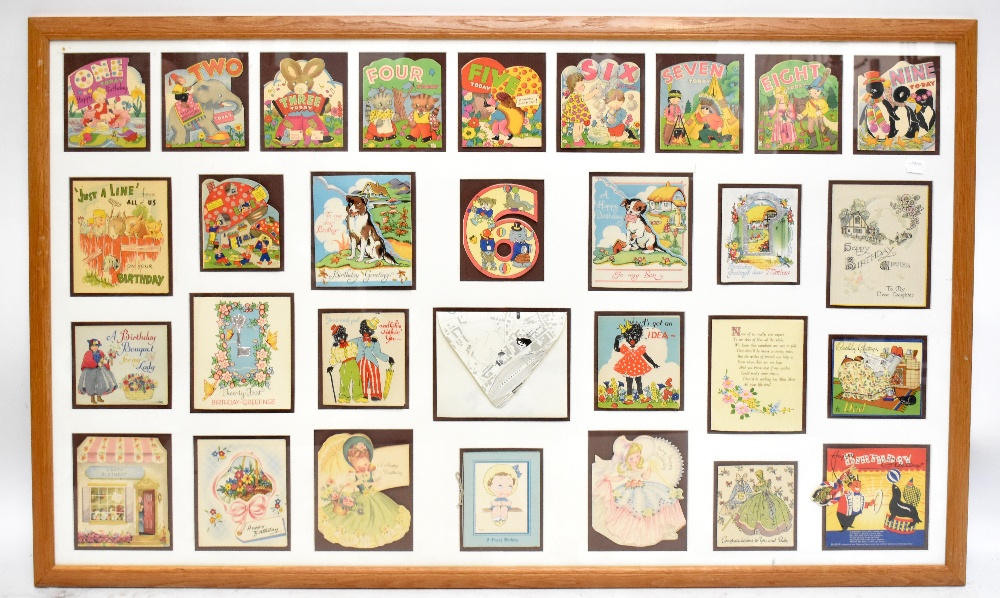 An unusual and attractive display of vintage greetings cards for children, frame approx 70 x