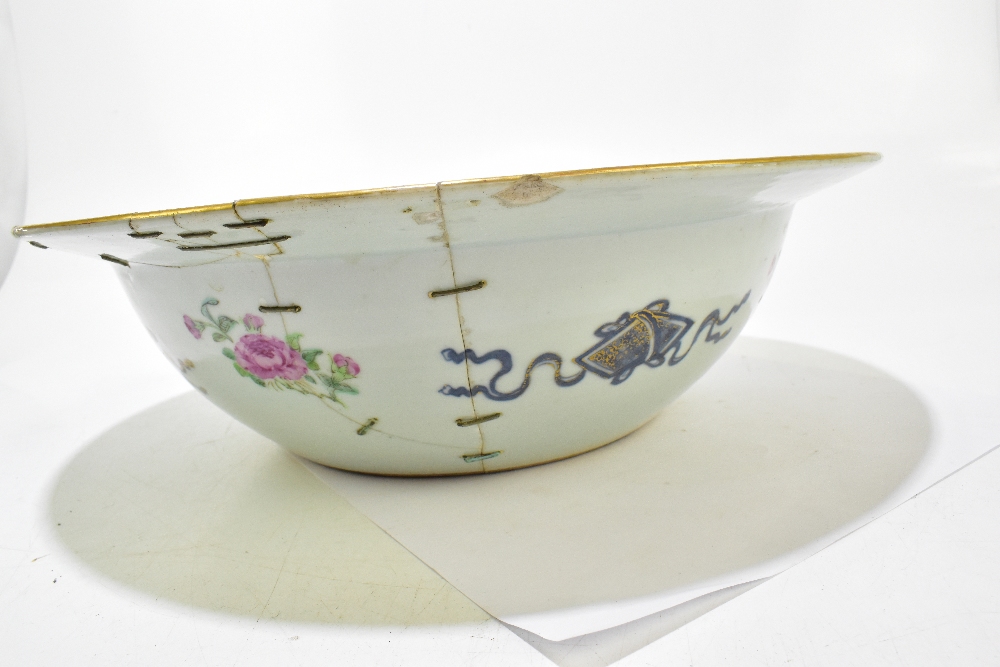 A large Chinese Canton Famille Rose bowl, painted with insects and floral sprays with gilt - Image 12 of 23