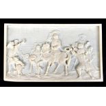 A late 19th century carved ivory plaque of rectangular form with carved detail in the 17th century-