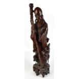 A large Chinese root wood carving of Shou Lao, height 90cm.Additional InformationSome natural splits