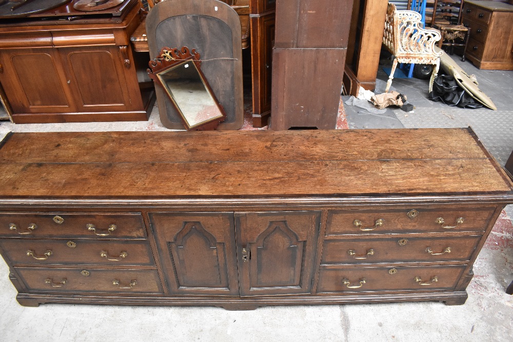 A good and large early 19th century oak and mahogany crossbanded North Country dresser base with two - Image 2 of 6