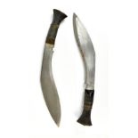 Two Gurkha Kukri knives of typical form in leather scabbards, and with stained handles and each with