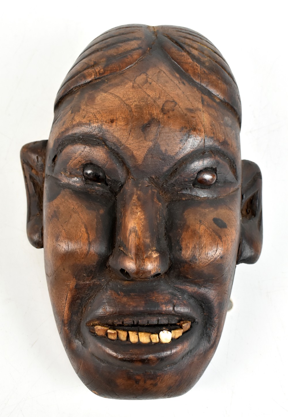An early 20th century Naga headhunter's skull head taking status mask trophy, Konyak people of