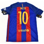 LIONEL MESSI; an FC Barcelona Nike 2016 home shirt with label bearing serial no.M5S446594 and La