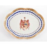 An 18th century Chinese export porcelain shaped bowl decorated in gilt and enamels with armorial