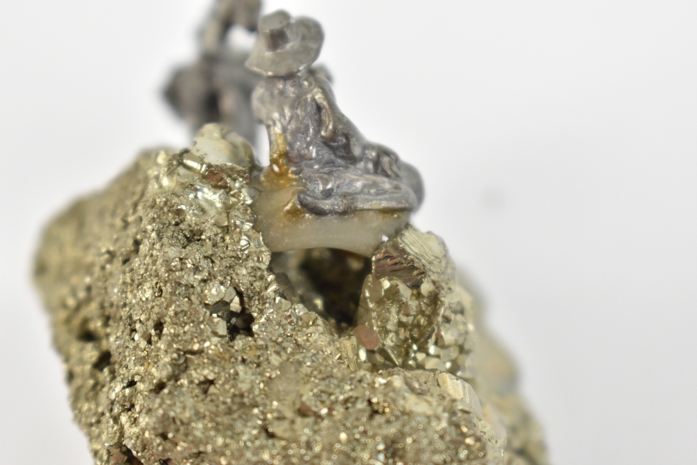 A small specimen of iron pyrite (fool's gold) surmounted with a small cast metal figure of a gold - Image 9 of 9