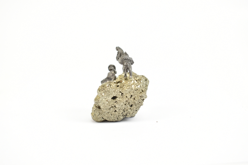 A small specimen of iron pyrite (fool's gold) surmounted with a small cast metal figure of a gold - Image 2 of 9