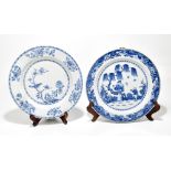 Two 18th century Chinese porcelain chargers, the slightly larger decorated with lady and child in