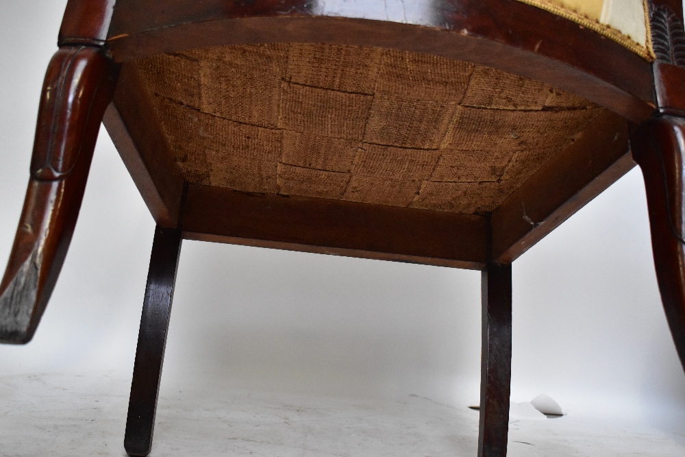 A 19th century French Empire mahogany elbow chair with padded back, scrolling swept arms, padded - Image 4 of 4
