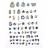 A group of Ancient Egyptian predominantly turquoise faience jewellery beads including shaped and