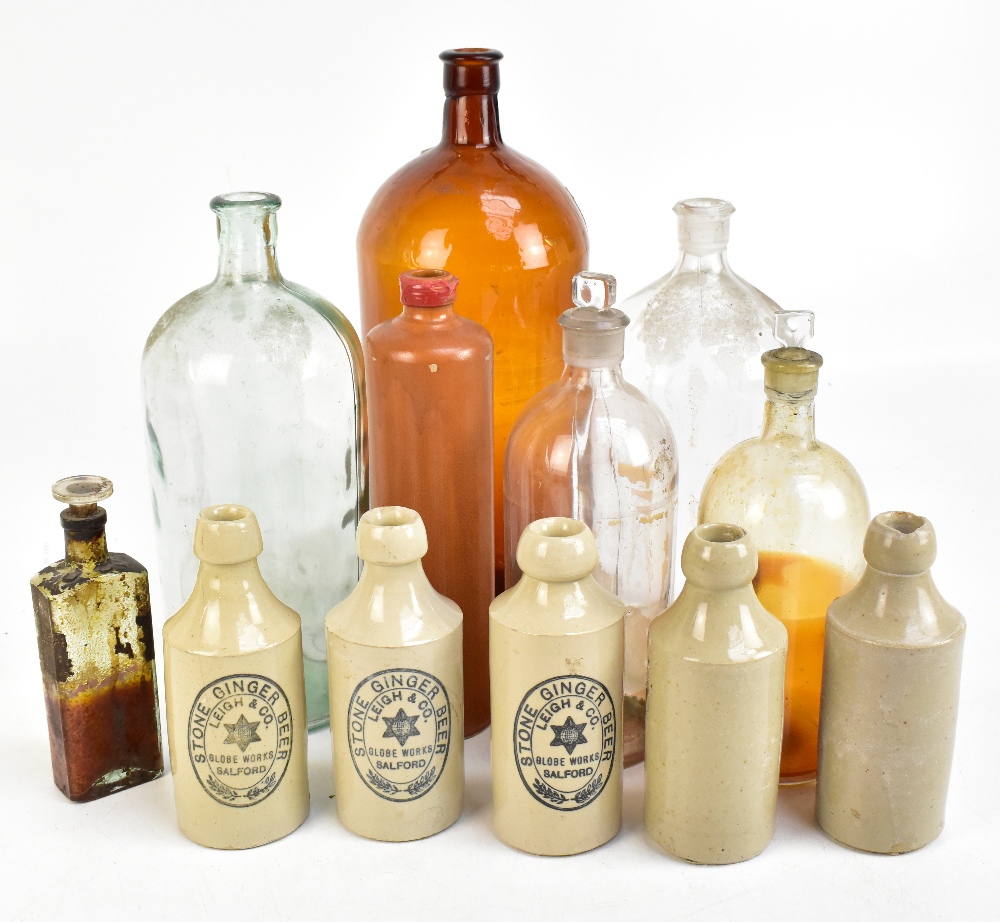 A collection of assorted poison bottles and ginger beers to include three examples by Leigh & Co