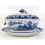 A circa 1800 Chinese blue and white oval serving dish, length 40cm and a Chinese export tureen and