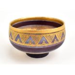 MARY RICH (born 1940); a porcelain bowl with gilt painted geometric decoration, impressed M and