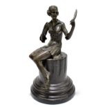A reproduction bronze figure in the Art Deco style, depicting a seated maiden holding a mirror,