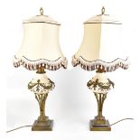 A pair of Empire-style gilt metal and ceramic table lamps with shades, height to top of shade