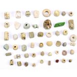 A group of Ancient Egyptian jewellery beads including faience turquoise examples with further of