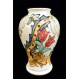 RACHEL BISHOP FOR MOORCROFT; a inverted baluster shaped vase decorated in the 'Golden Lily' pattern,