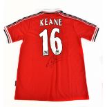 ROY KEANE; a Manchester United Umbro 1998-99 season retro remake home shirt, signed with 'Keane