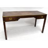 A campaign-style brass bound two drawer writing table, height 72cm, width 137.5cm, depth 60.5cm.