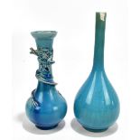 A Chinese turquoise glazed dragon applied vase, unmarked, height 20.5cm, and a similarly glazed
