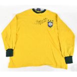 PELÉ; a Toffs cotton retro remake Brazil home shirt with embroidered crest beneath three stars,