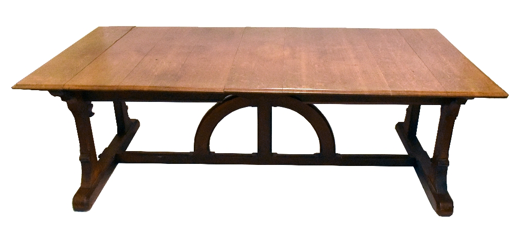 IN THE MANNER OF AUGUSTUS WELBY NORTHMORE PUGIN; an oak Gothic Revival dining table with moulded