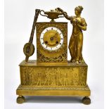 GILLION OF PARIS; a 19th century gilt metal mantel clock, the circular enamelled chapter ring set