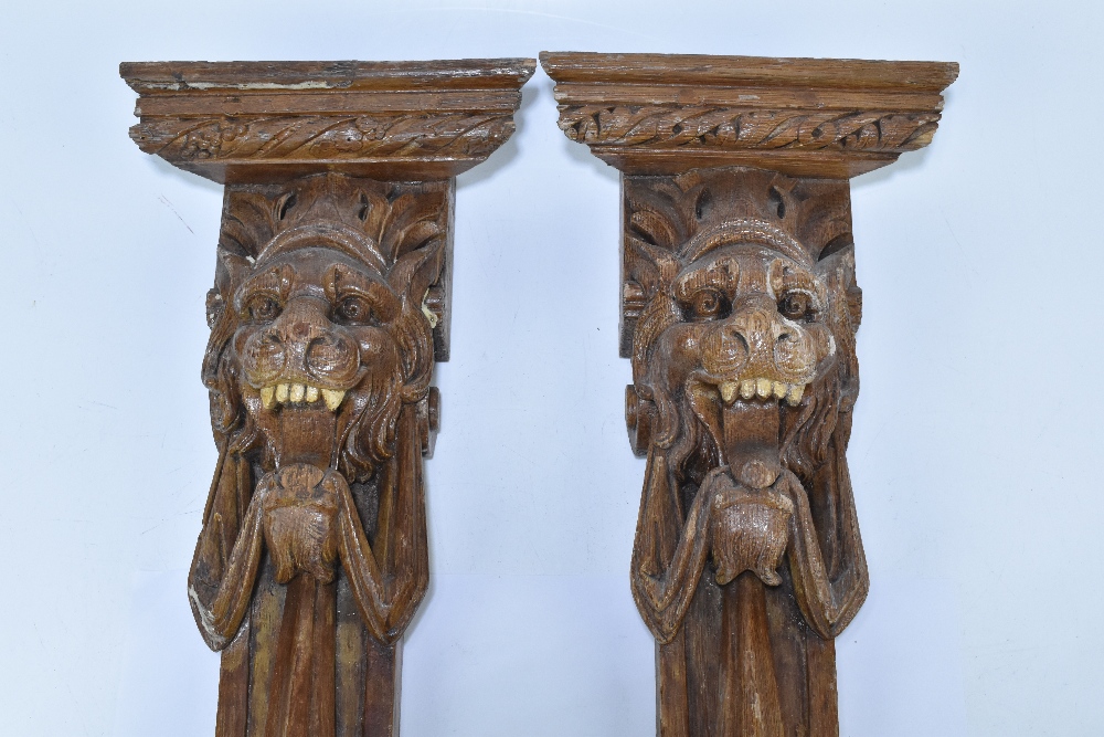 Two late 19th/early 20th century stained oak furniture sections with moulded cornices above lion - Image 2 of 5