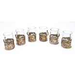 WILLIAM COMYNS; a Victorian cased set of six hallmarked silver mounted liqueur glasses, the silver