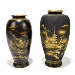 Two Japanese Satsuma vases each with gilt decoration on black ground, depicting Mount Fuji, height