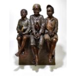 HANIROFF FOR GOLDSCHEIDER; a large terracotta figure group c.1895 modelled as three young boys