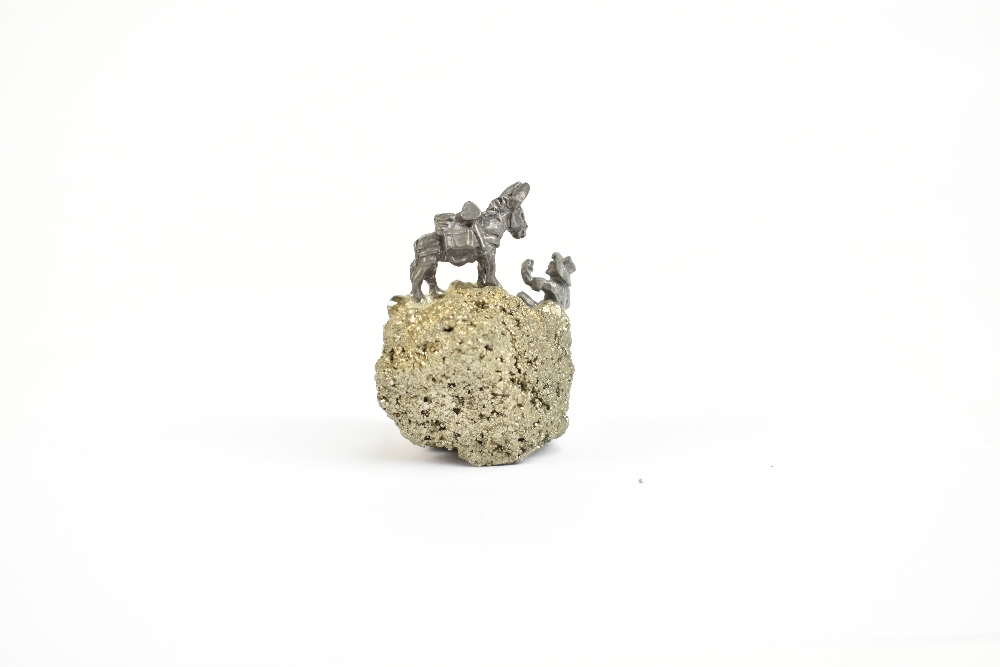 A small specimen of iron pyrite (fool's gold) surmounted with a small cast metal figure of a gold - Image 5 of 9