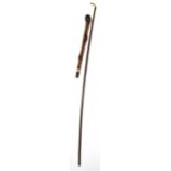 A riding crop with carved bone horse hoof handle, length 88cm, together with a section from a