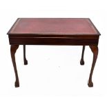 A reproduction mahogany veneered table canteen, the top with maroon leather inset, housing a suite
