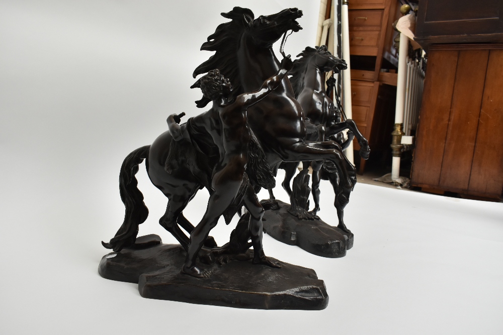 AFTER GUILLAUME COUSTOU; a very large pair of late 19th century bronze Marly horses, each bearing - Image 2 of 7