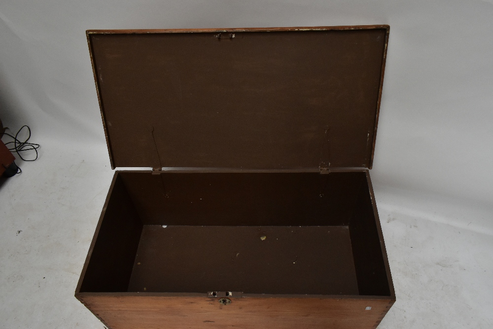A late Victorian pine blanket box with hinged lid and twin side carrying handles, width 100cm. - Image 3 of 3