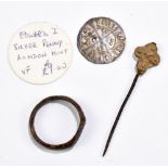 An Edward I silver penny, London Mint, diameter 19mm, a bronze ring with engraved detail and a Saxon