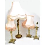 Four decorative brass table lamps (4).