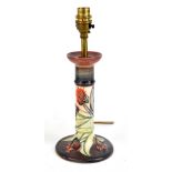 MOORCROFT; a candlestick table lamp decorated in 'Tulip' pattern, height 21cm.Additional