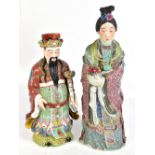 Two large Chinese Republic period figures, one depicting an emperor holding a ruyi sceptre, the