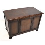 1950s stained oak blanket chest, with panelled detail to the front, raised on bun feet, length 91cm,