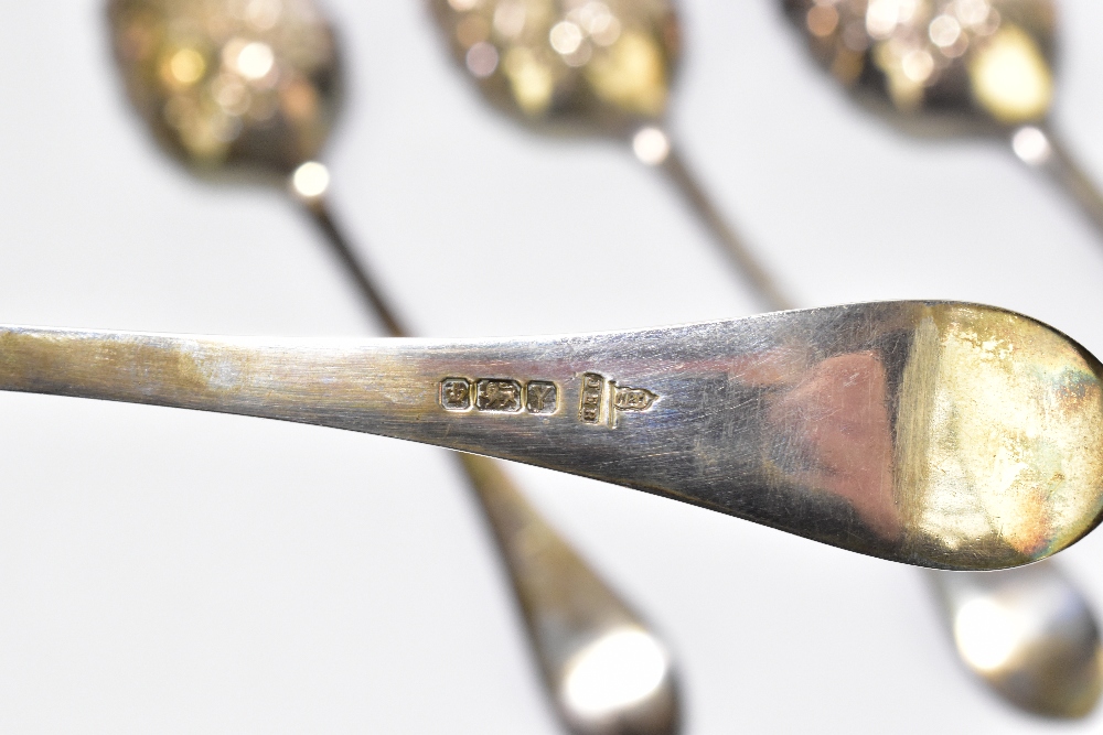 WALKER & HALL; a cased set of four Victorian hallmarked silver berry spoons, with cast decoration to - Image 4 of 4