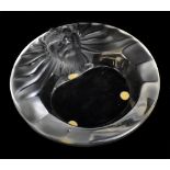 LALIQUE, FRANCE; a clear and frosted glass ashtray, 'Tete de Lion', signed to rim, diameter 14.5cm.