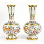 A pair of Chinese cloisonné enamelled gilt metal vases featuring butterflies amongst floral sprays