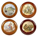 A group of four 19th century Staffordshire pot lids, 'The Wolf and the Lamb', 'War', 'Garibaldi',