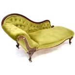 A Victorian walnut chaise longue, button back upholstered in a green velour,