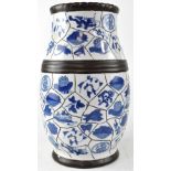 A modern Chinese blue and white vase of baluster form decorated with panels of fruits, flowers,