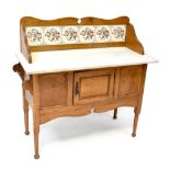 An Edwardian oak marble topped washstand,