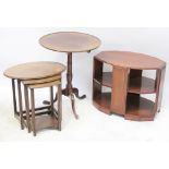 A nest of three oval side tables,
