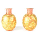 A pair of Royal Crown Derby vases of globular form, pink and yellow ground and gilt decorated,